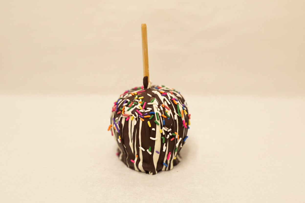 Dark Chocolate Caramel Apple with White Chocolate Drizzle and Sprinkles