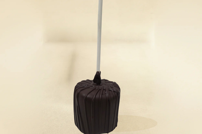 Dark chocolate marshmallow pop with dark drizzle