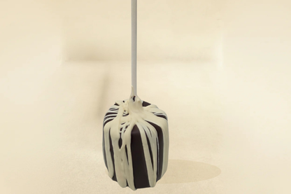 Dark Chocolate marshmallow pop with white drizzle