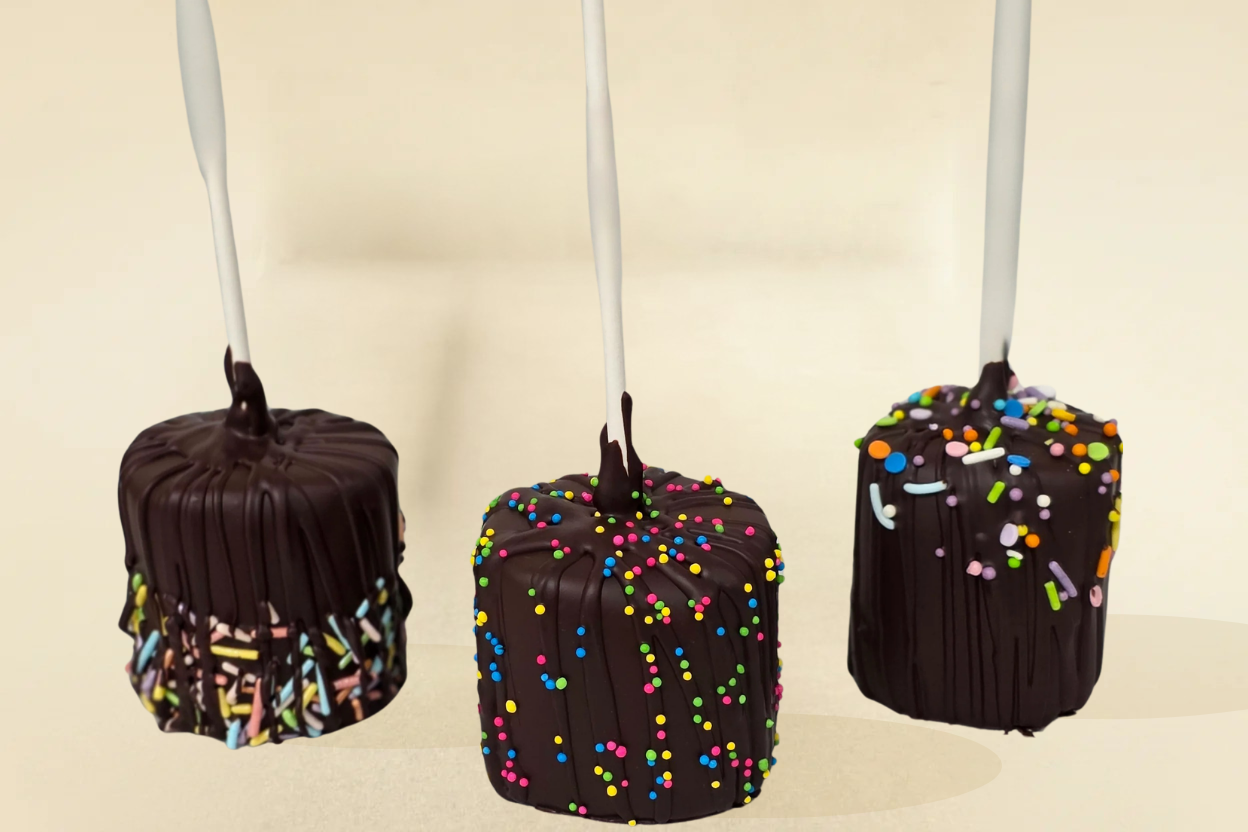 Dark chocolate marshmallow pops with sprinkles