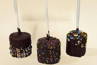 Dark chocolate marshmallow pops with sprinkles